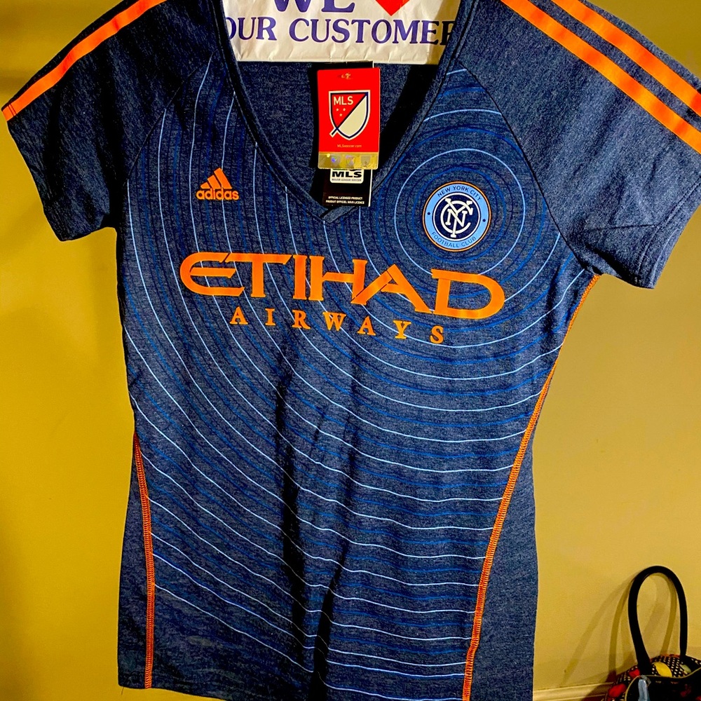 Adidas NYC MLS shirt.